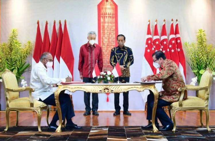 Disaksikan Presiden Jokowi, Menkumham Tandatangani Perjanjian Ekstradisi dengan Singapura